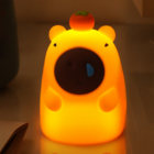 Capybara taps the small night light